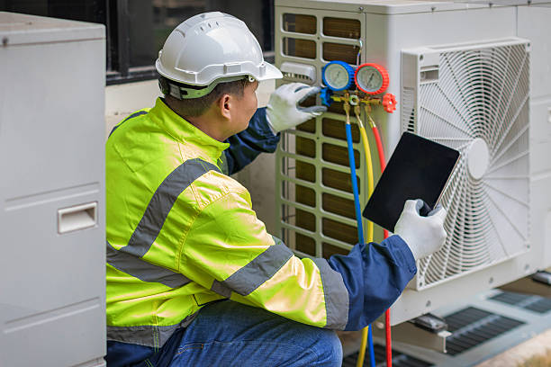 Professional Air Duct Cleaning technician working in Marietta, OK